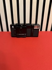Minolta AF-C con obiettivo