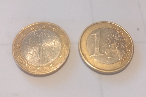 Moneta euro con - euro, di