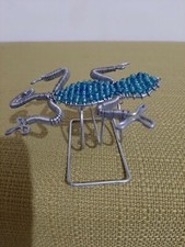 African beaded napkin ring stand Gecko design