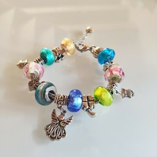 Bracciale tipo Pandora con charms in vetro di Murano. Regolabile. Artigianale 