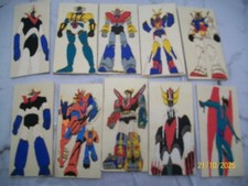 10  robot anni 80 incisi con