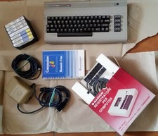 Commodore C64 + Trasformatore, manuale, registratore Magnum e giochi