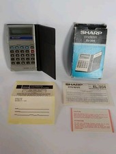 Calcolatrice vintage SHARP modello ELSI MATE EL-304 con scatola e manuale