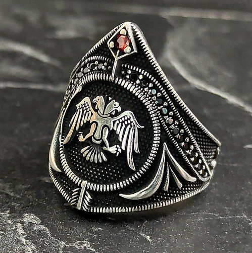 Anello uomo doppio testa