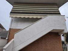 tenda da sole a bracci estensibili