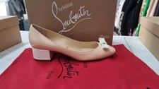 CHRISTIAN LOUBOUTIN scarpe