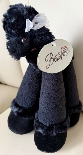 Peluche barboncino nero piedi