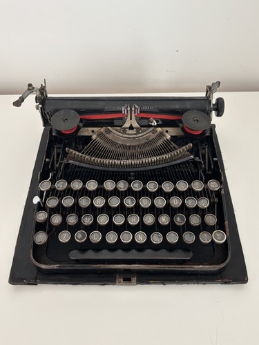 Vintage erika black typewriter - vintage,