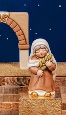 THUN SUGGESTIVA DONNA CON