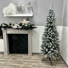 Alberi di natale slim innevato