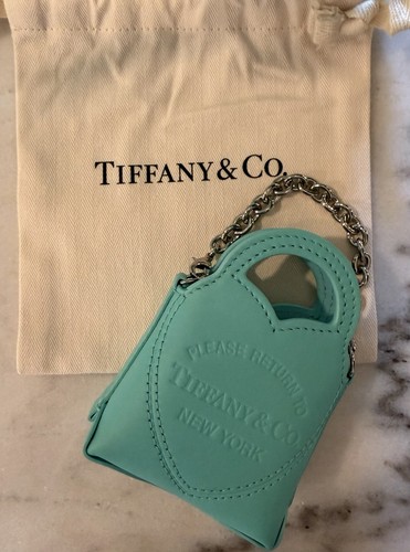 Tiffany please return - &,