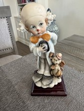 Statuina Giuseppe Armani