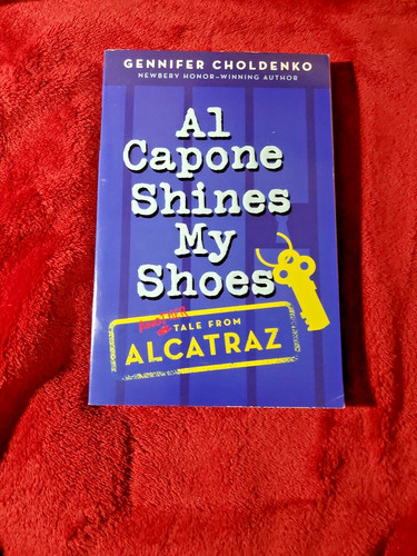 Capone shines shoes by - al,