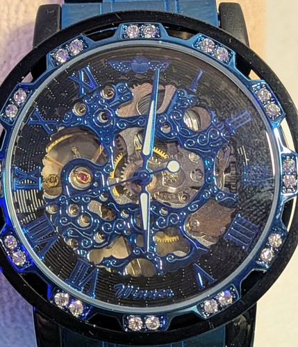 Orologio scheletro carica - orologio,