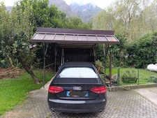 Tettoia in ferro con copertura in pannelli spessore 5 cm