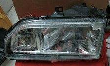 faro anteriore SX Ford SIERRA. NUOVO e COMPLETO