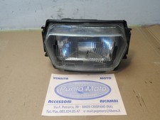 Faro delantero original para