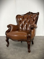Poltrona Chippendale in pelle