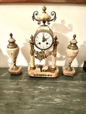 Trittico orologio E Vasi