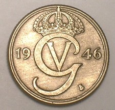 Moneta monogramma incoronata
