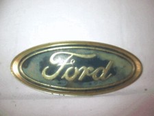 3U5A-19H250-FA FREGIO LOGO STEMMA SCRITTA "FORD" 115 MM COFANO POSTERIORE FORD T