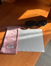 Occhiali da Sole MIU MIU Ovali