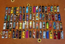 Lotto 72 accendini da collezione (usati) fantasie, disegni e marchi vari