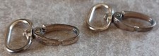 Ganci ovali a moschettone in metallo ottonato. Per borse, zaini, marsupi