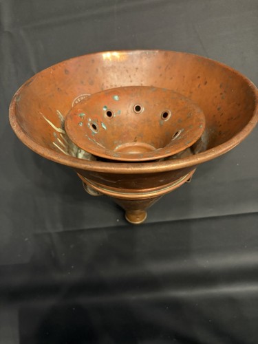 Antico colino imbuto per