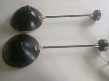 A  pair of wall lights in the