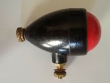 ? WWII Fanalino posteriore da oscuramento in bachelite per bicicletta d'epoca?
