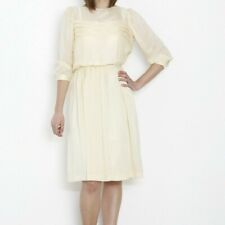 Vestito vintage anni 70  color giallo pastello con fantasia a righe taglia 40