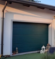 Portone sezionale per garage motorizzato