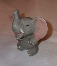 FIGURINA ELEFANTE CHE RIDE