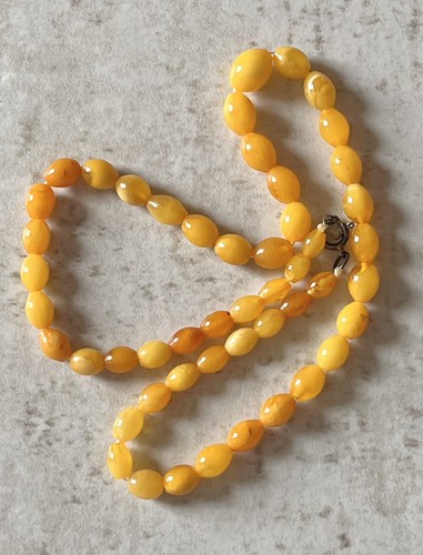 Collana perle ambra - di,