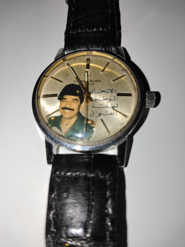 Saddam watch favre - saddam,