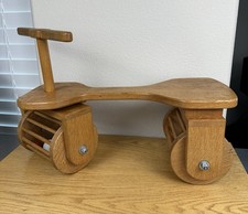 Triciclo in legno per bambini