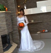 abito da sposa bianco di pizzo