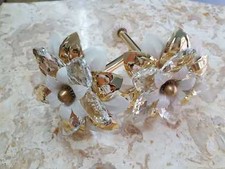 COPPIA FERMA TENDA CON FIORE