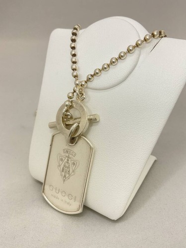 Collana catena sfera etichetta