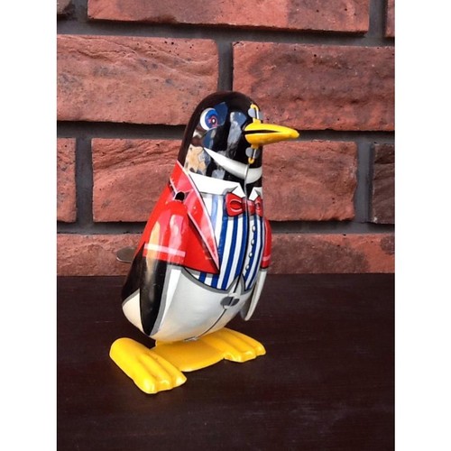Pinguino giapponese wind - wind, up