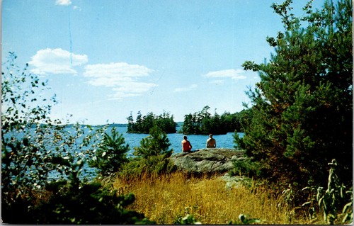 Lake with two people - , sitting