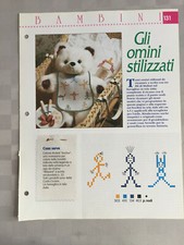 Schema punto croce Bambini Gli omini stilizzati bavaglino