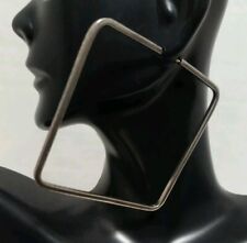 Orecchini a cerchio quadrato