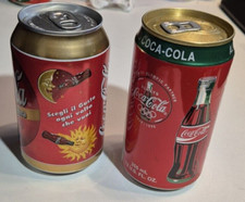 2 LATTINE COCA COLA 1 PIENA