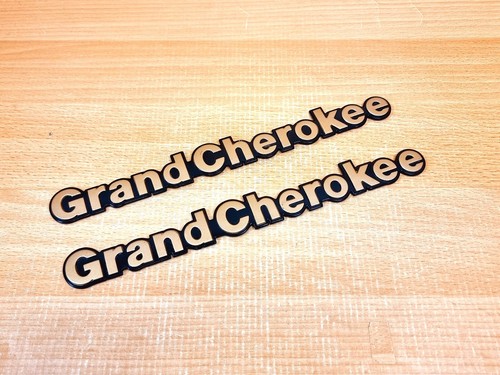 Emblema jeep grand cherokee - grand,