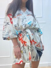 abito corto fondo bianco con