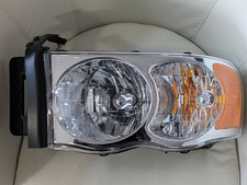 Faro delantero izquierds Dodge