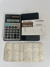 Calcolatrice solare convertitore metrico Sharp EL-344G con manuale operazioni 