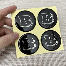 4 adesivi coprimozzo emblema